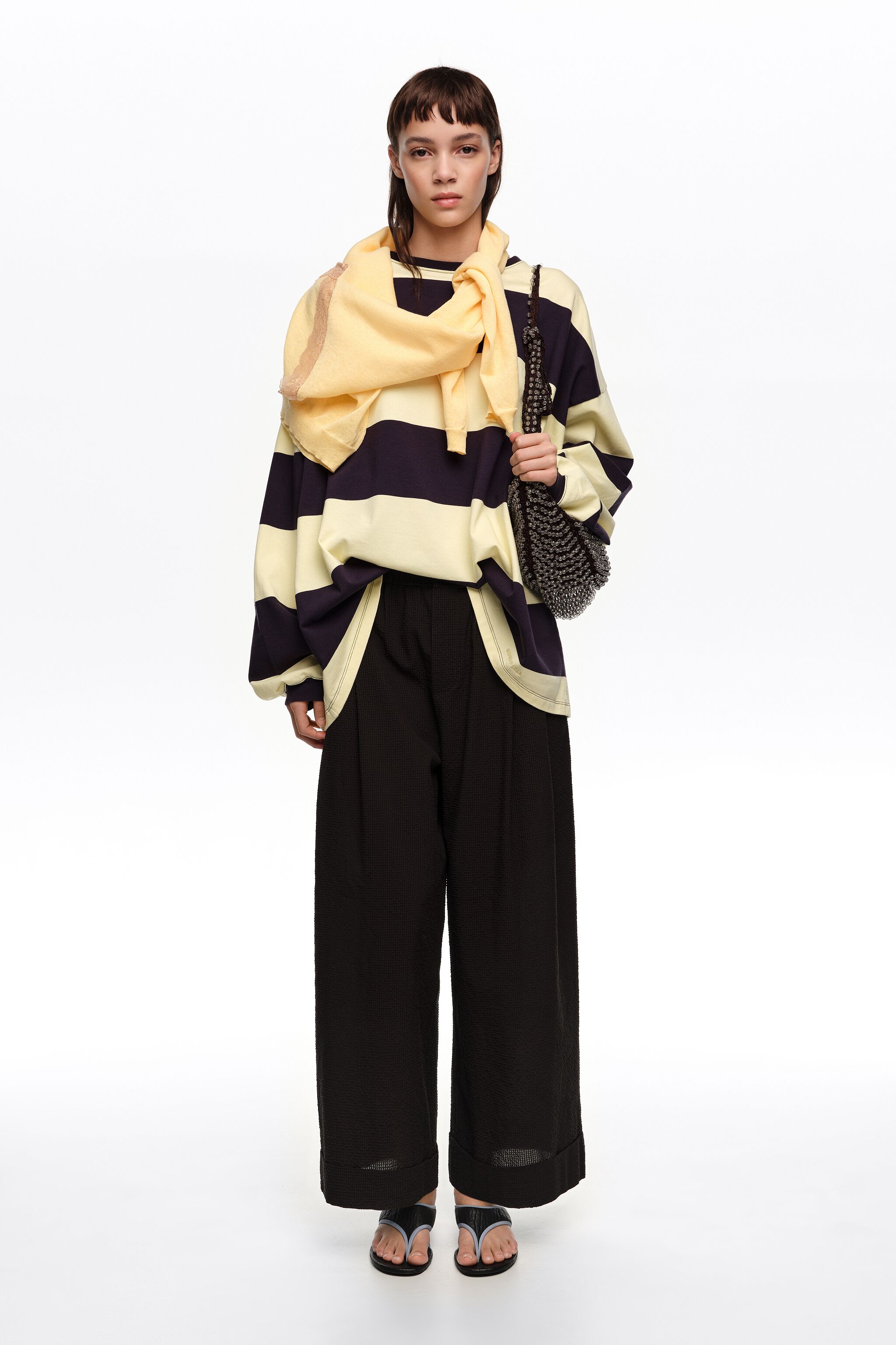 Black textured bell-bottom trousers