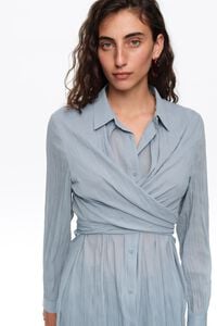 Camisa plisada azul claro