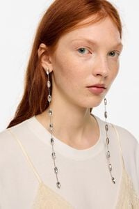 Crystals and aged silver-tone chain earrings