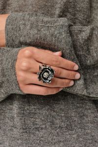 Silver flower ring with crystal