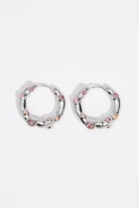 Silver textured metal hoop earrings with pink crystals