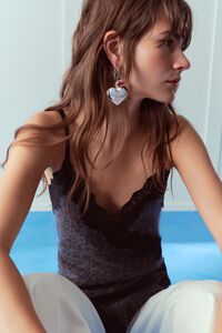 Pendientes multicharms corazones plateados