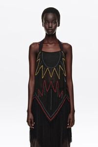 Black embroidered knit top with fringing