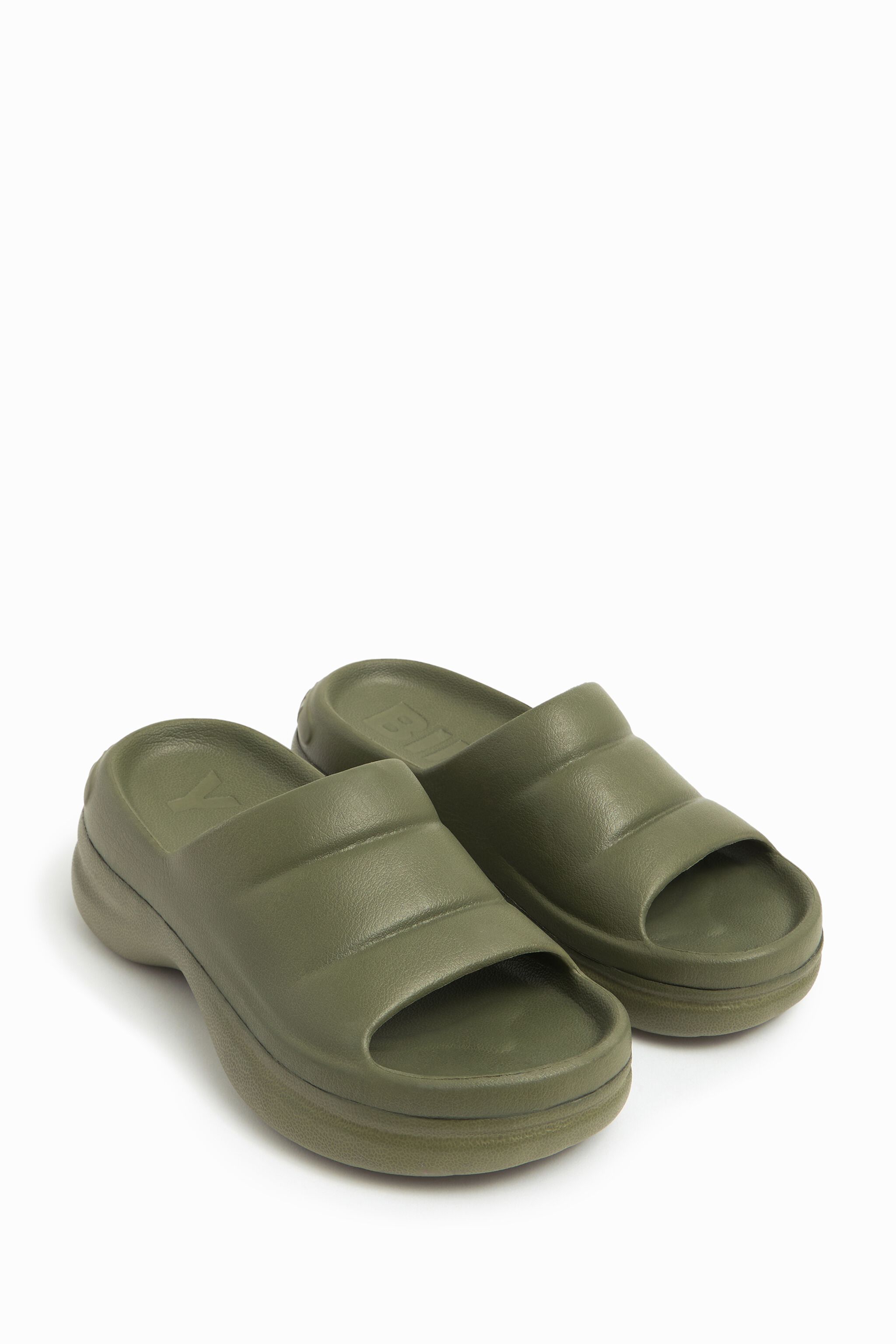 green platform flip flops