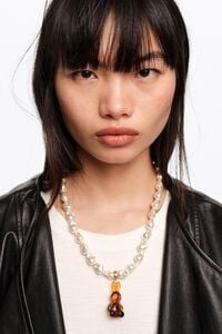 Amber resin rabbit and pearl necklace