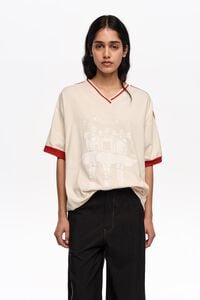 Ivory V-neckline Dancers logo T-shirt