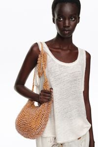 Medium crochet bag in amber beaded fabric