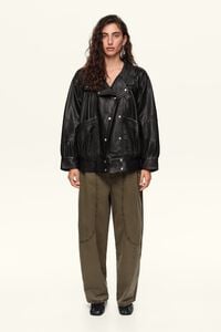Black leather jacket with volume