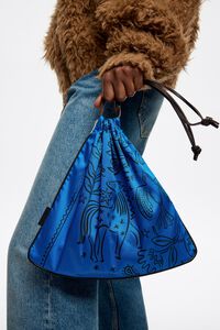 Bolso pouch pa&ntilde;uelo esot&eacute;rico marfil