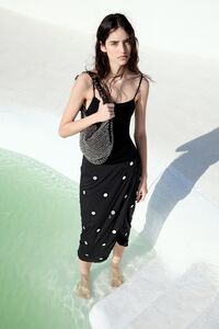 Small crochet bag in chocolate beaded fabric