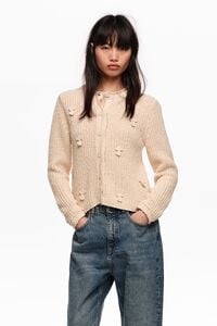 Beige cotton cardigan with flat bobbles