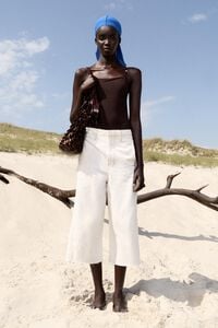 Chocolate swimsuit with beads