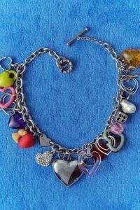 Silver hearts multicharm necklace