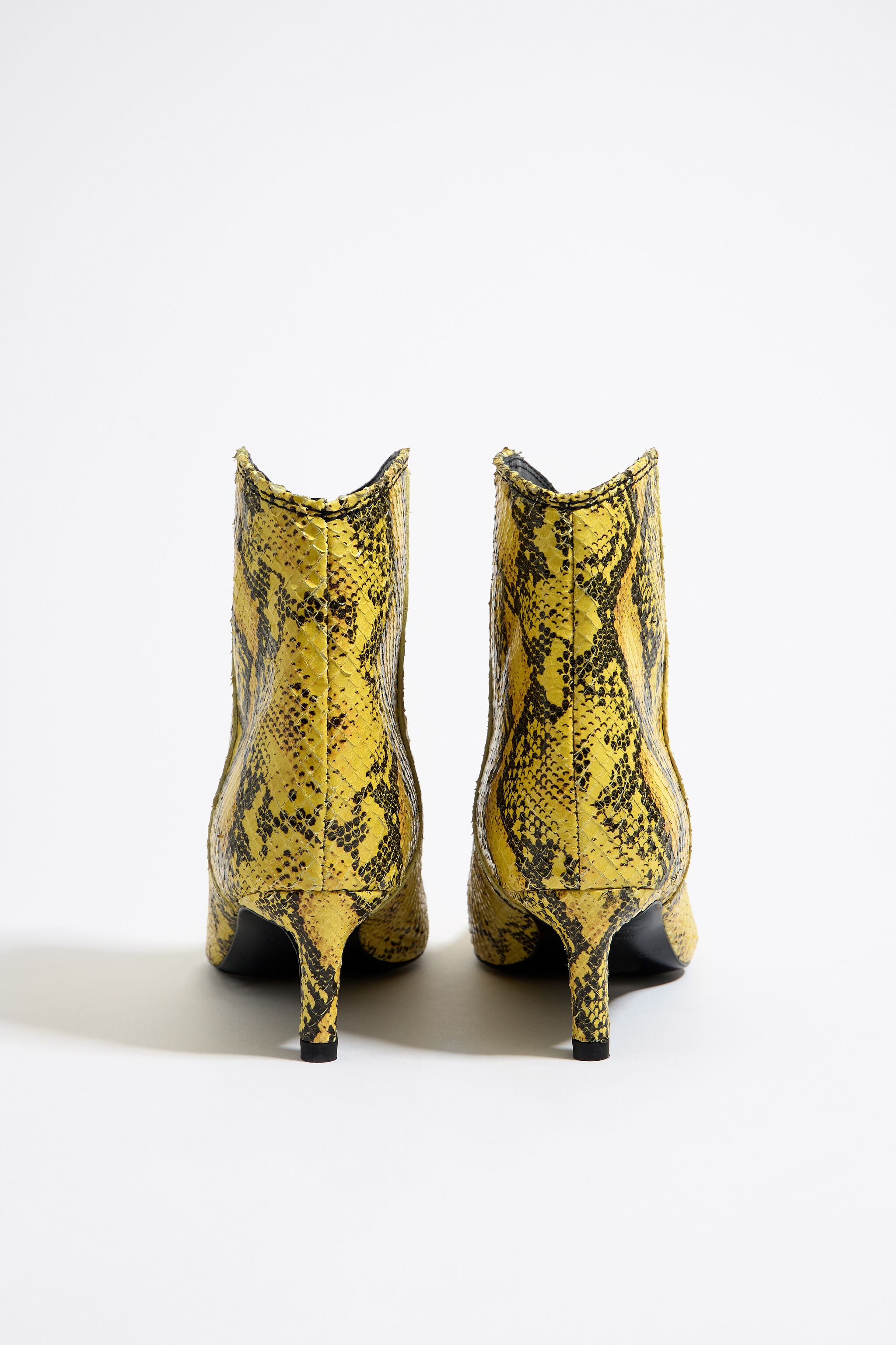 Slouchy suede boots in yellow - Paris Texas | Mytheresa