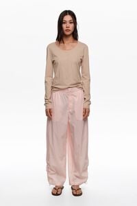 Light pink gathered jogger trousers