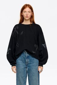 Short washed black sweatshirt with stones and bows