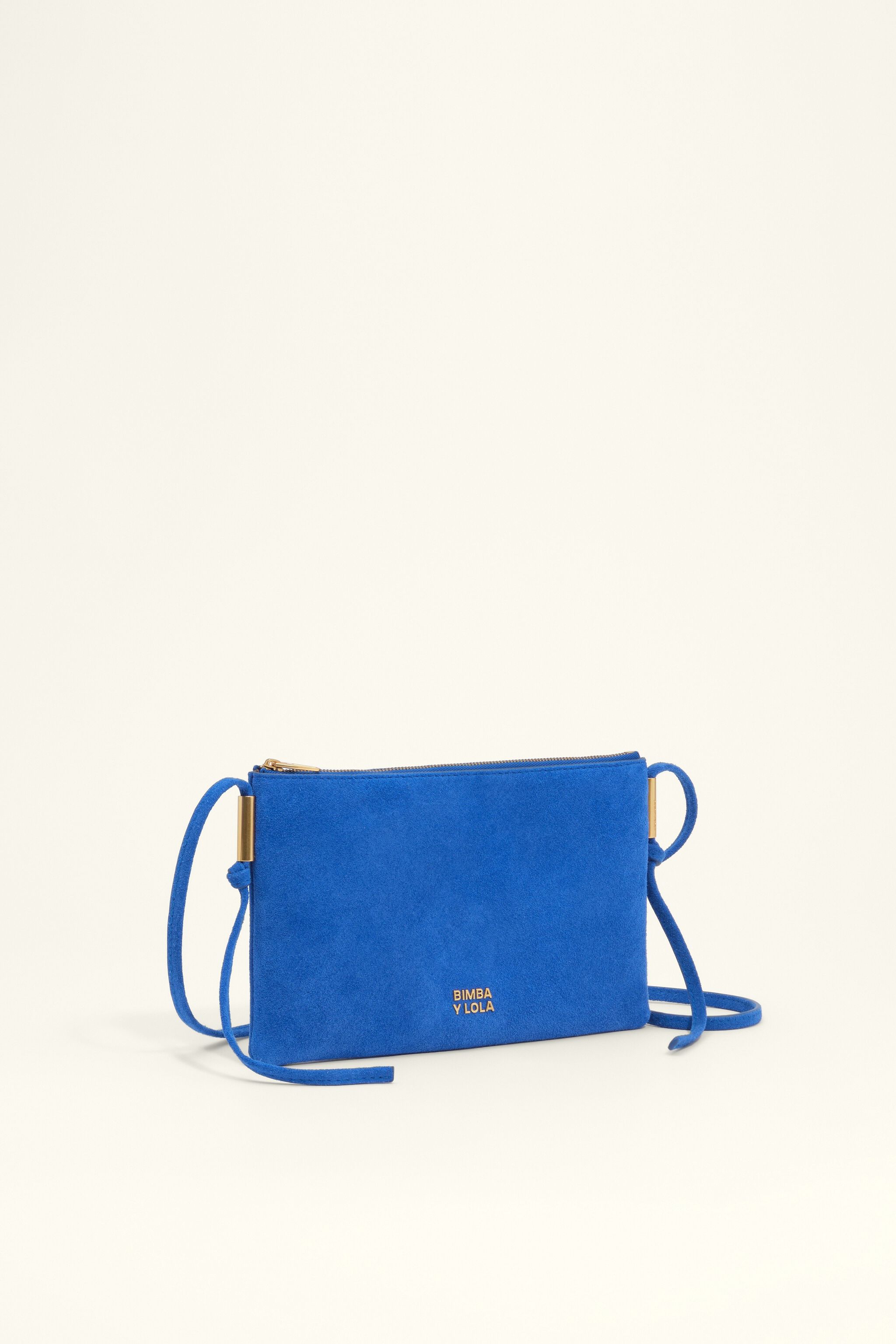 Small electric blue suede clutch bag
