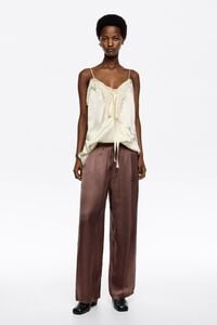 Cal&ccedil;as jogger pin&ccedil;as castanhas