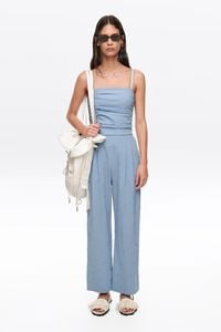 Blue striped jumpsuit with gathered straps
