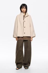 Chaquet&oacute;n doble faz l&iacute;nea A marfil