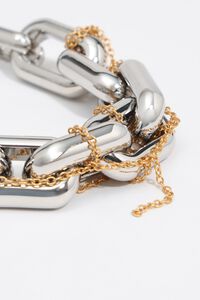 Pulseira corrente prateada corrente fina atada dourada