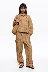 Underwater cropped jacket with stitching and patches