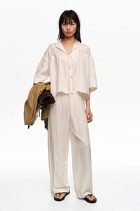 White linen shirt with ties and lace