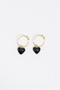 Gold hoop earrings and black heart