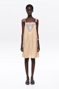 Short orange silk strappy dress