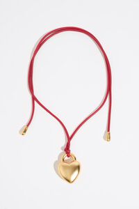 Matte gold heart necklace with red cord