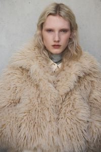 Short ivory fur coat