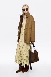 Vestido plisado irregular Notebook amarillo claro