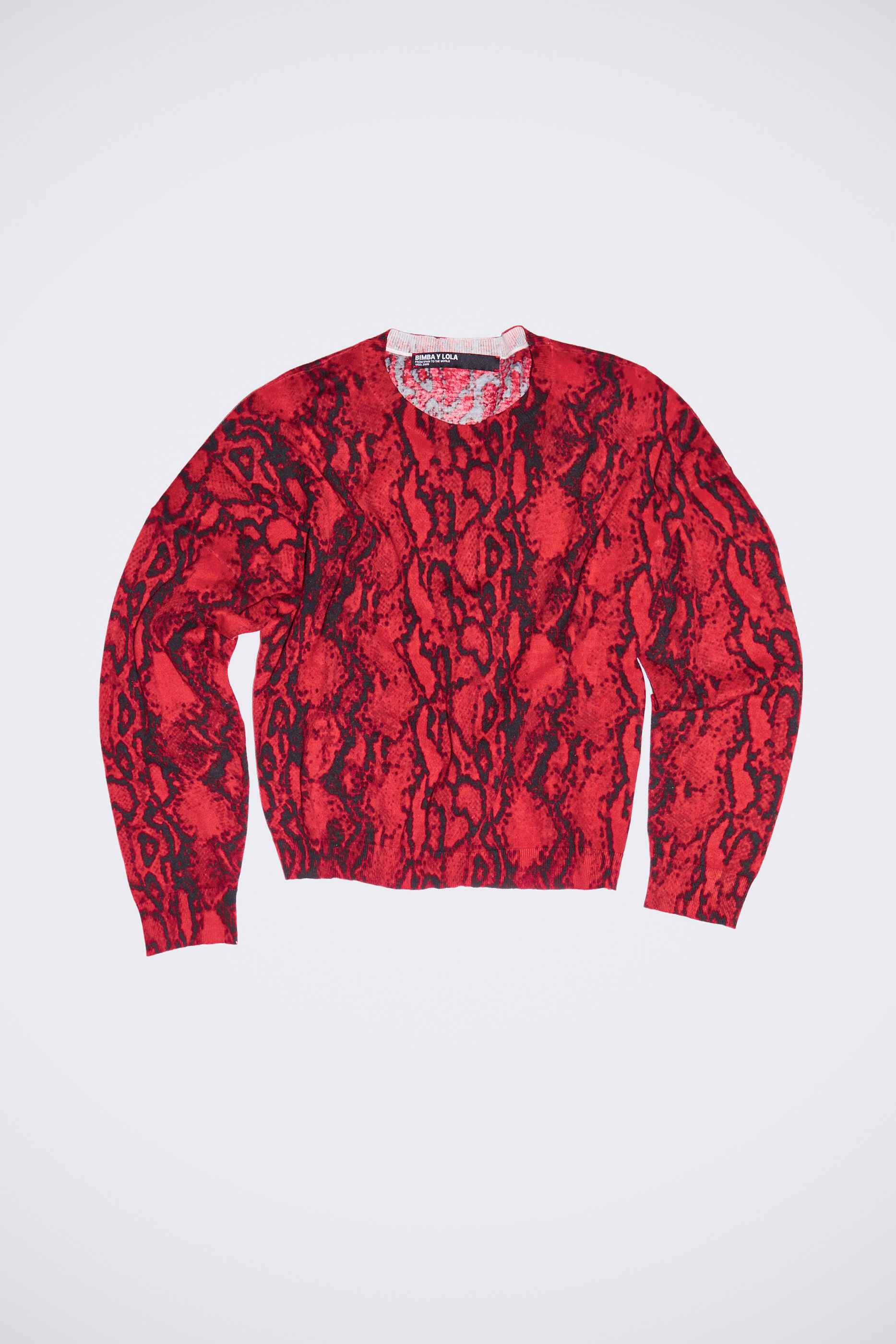 Red Python print wool sweater