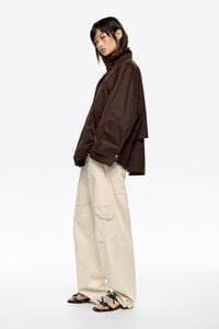 Dark brown coated A-line trench