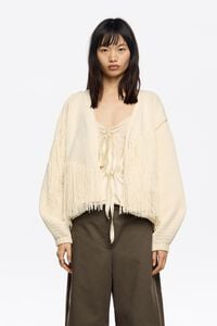 C&aacute;rdigan punto flecos marfil