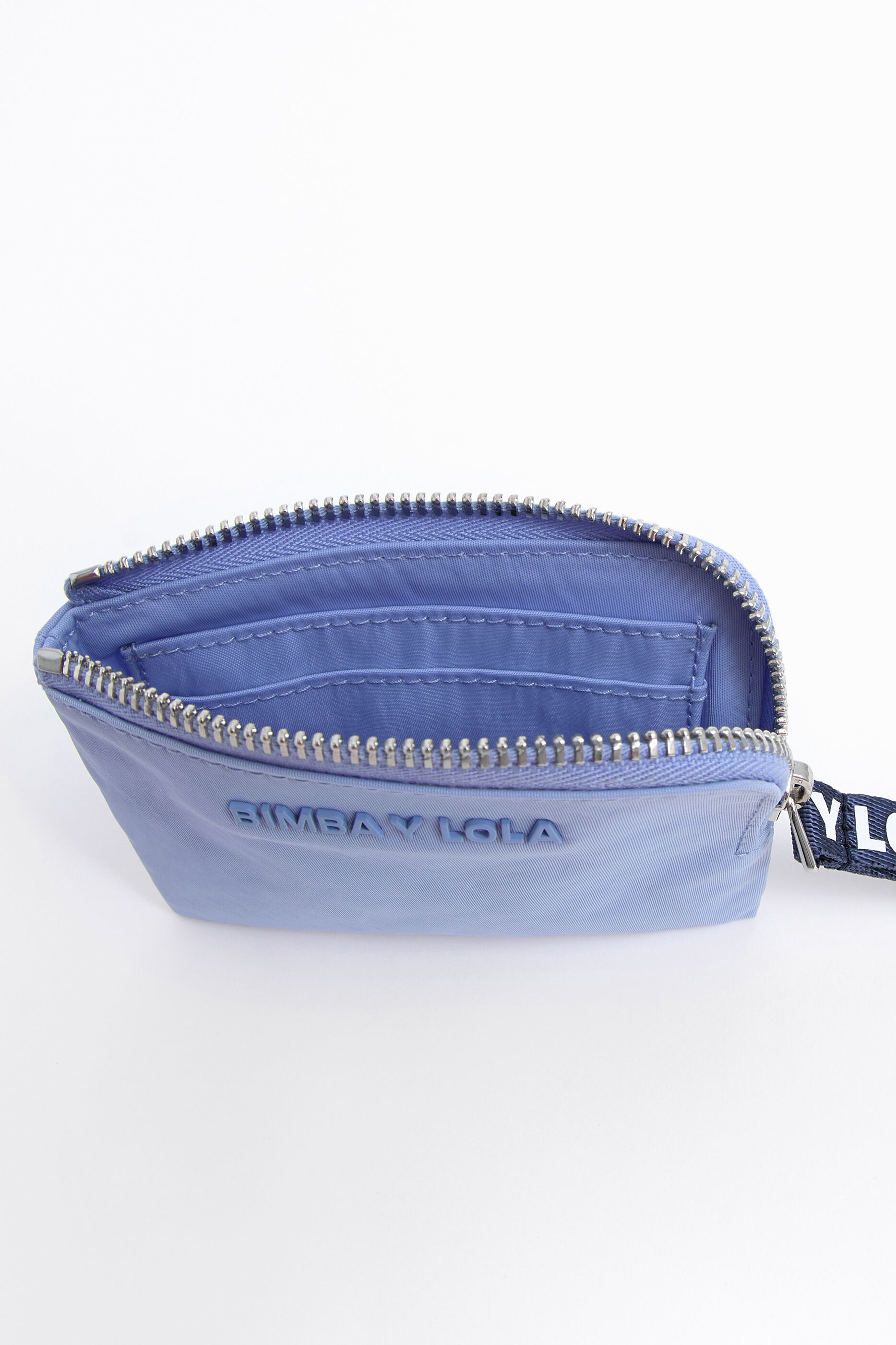 Monedero curvo S nylon azul pastel