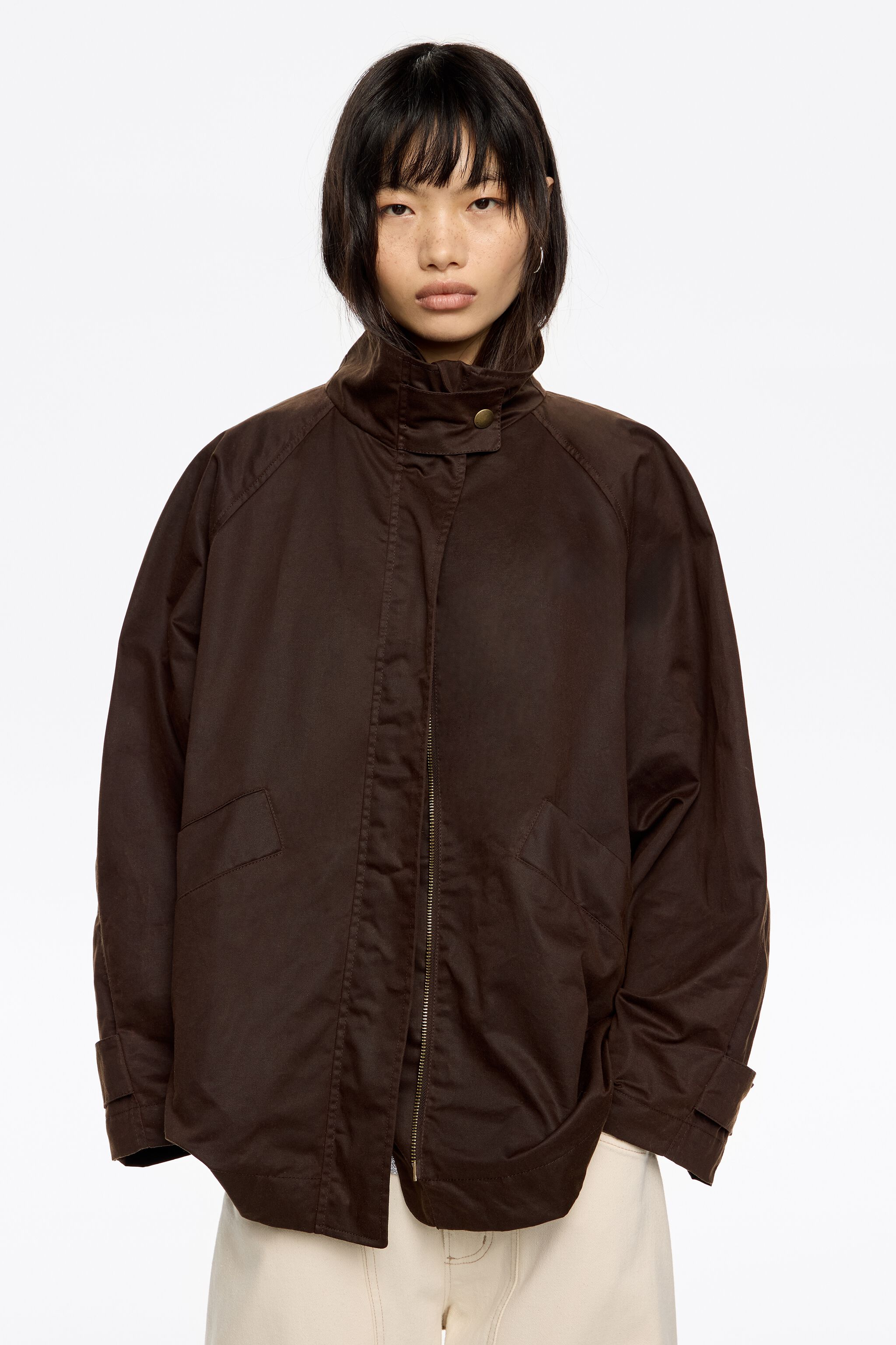 Dark brown coated A-line trench