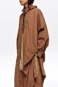 Long light brown fluid trench