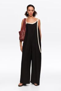 Straight black jumpsuit with contrasting straps