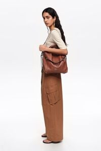 Medium dark tan leather Paper bag