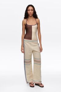 Pantal&oacute;n recto tobillero lino rayas crudo