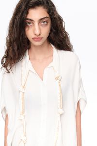 White knotted neckline cape shirt
