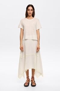 Falda midi irregular bordados crema