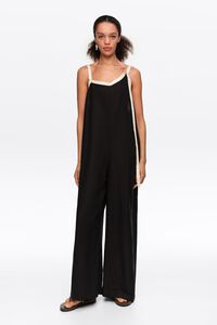 Straight black jumpsuit with contrasting straps