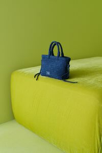Blue plaited suede crossbody bag