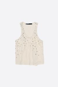 Beige top with mother-of-pearl pieces