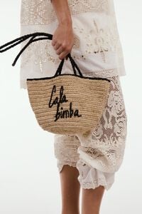 Small natural raffia basket bag