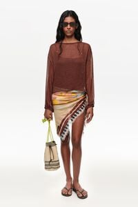 White boxy sweater with metallic beads