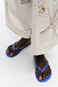 Blue semi-transparent flip-flop