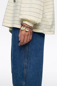 Pulsera logos coraz&oacute;n plateada